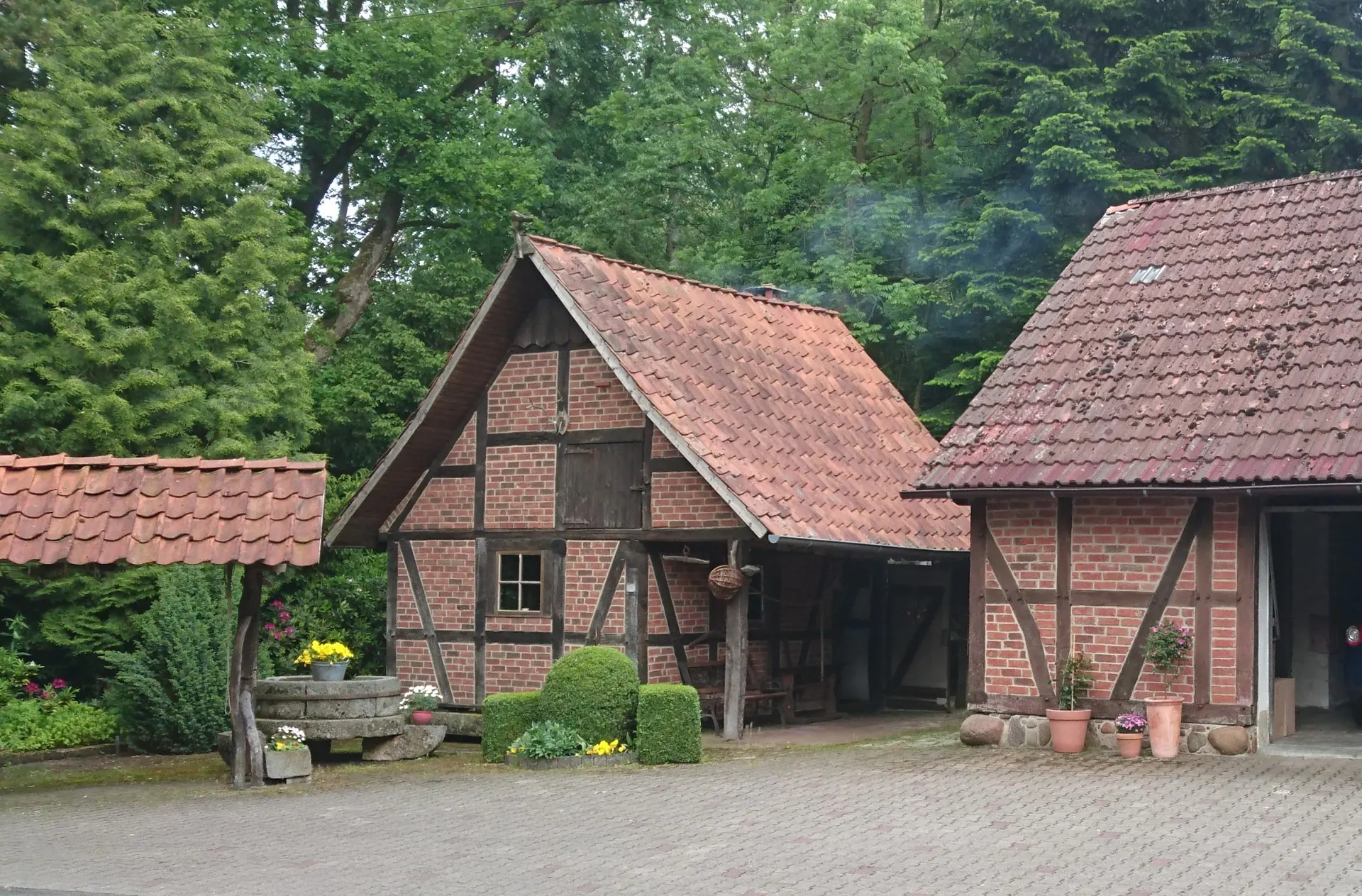 The half-timbered bakehouse in the mill yard