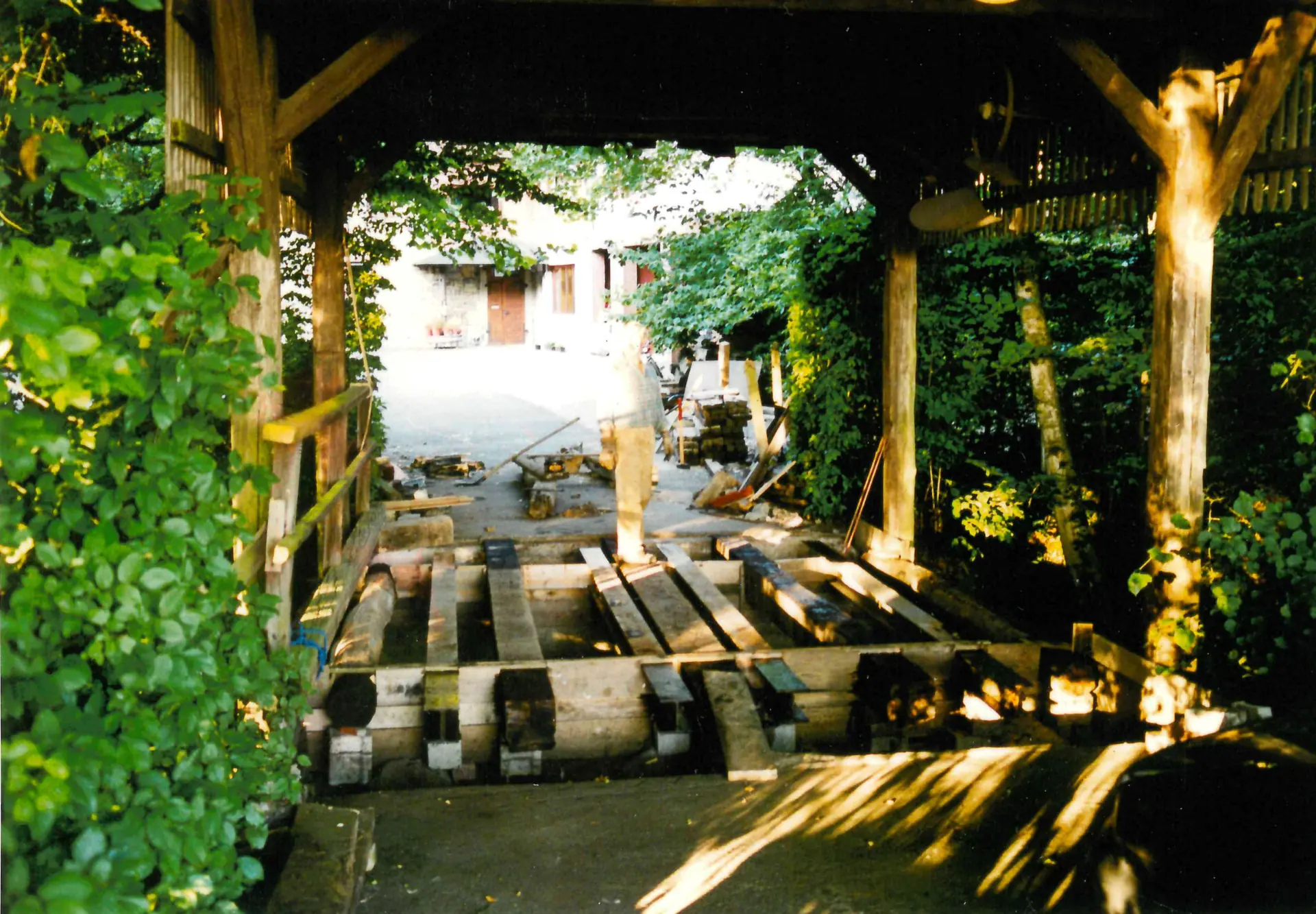 Renovating the covered bridge in 2001: new planks on the substructure