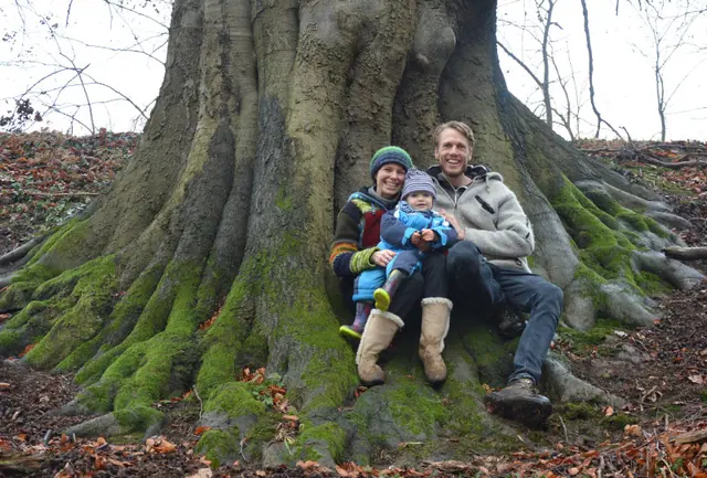 Theresia and Bernard with their child at the mossy foot of the Mühlenbuche